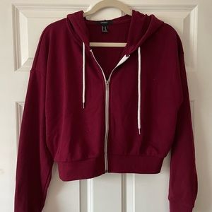 maroon red cropped zip up